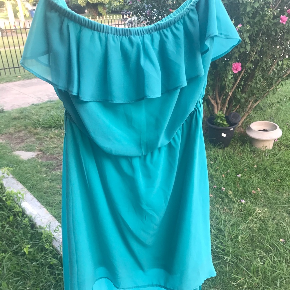 Turquoise dress with tail